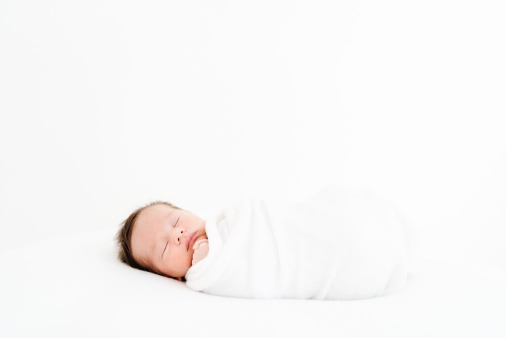 A natural light studio newborn photo session in Melksham, Wiltshire - Rebecca Casey Photography